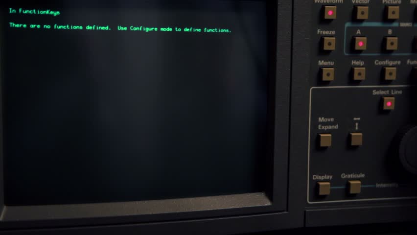 Curve appear on screen of oscilloscope, hand push some buttons and freezes line
