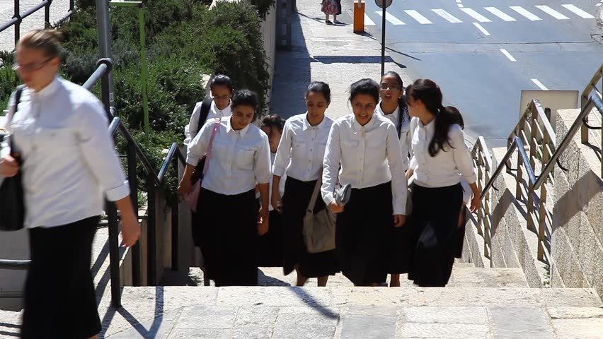 JERUSALEM, ISRAEL - CIRCA OCT 2011: Jewish school girls head towards the Western Wall before Yom Kippur circa October 2011 in Jerusalem.