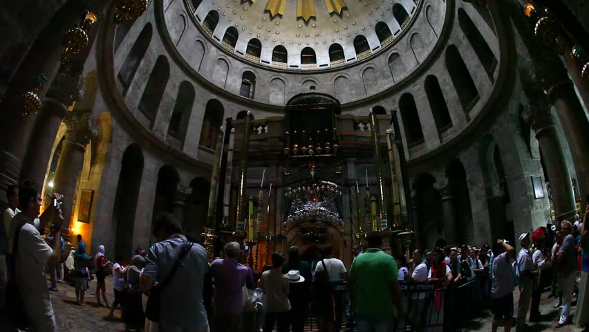 JERUSALEM, ISRAEL - CIRCA OCT 2011: Visitors observe the Rotunda and the Edicule in the Church of the Holy Sepulchre circa October 2011 in Jerusalem.