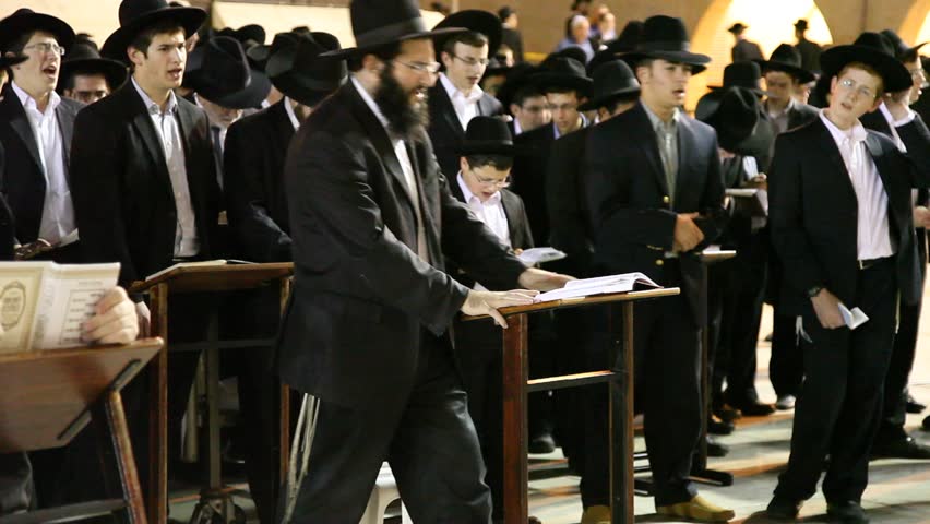 JERUSALEM, ISRAEL - OCT 6, 2011: Yeshiva students pray during Slihot at the Western Wall on October 6, 2011 in Jerusalem.