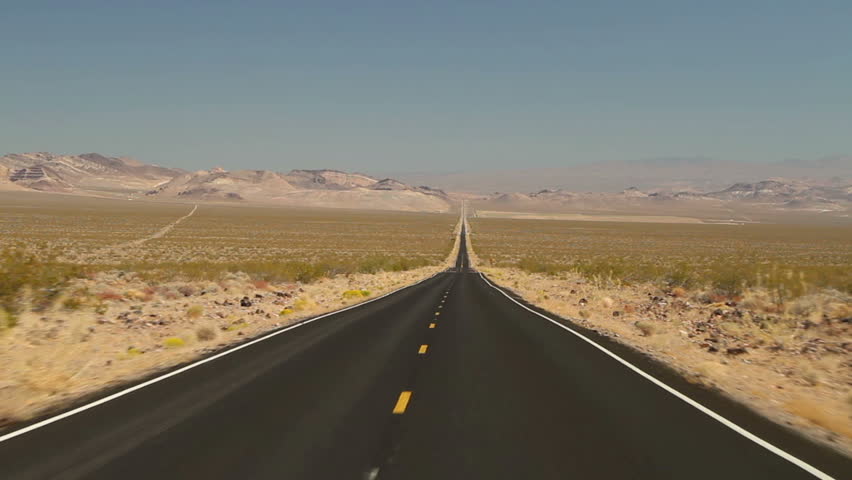 Driving shot on an empty road in Death Valley National Park