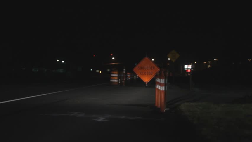 traffic cones and road sign