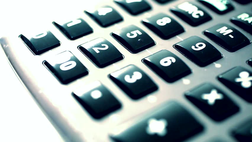 Businessman using a calculator