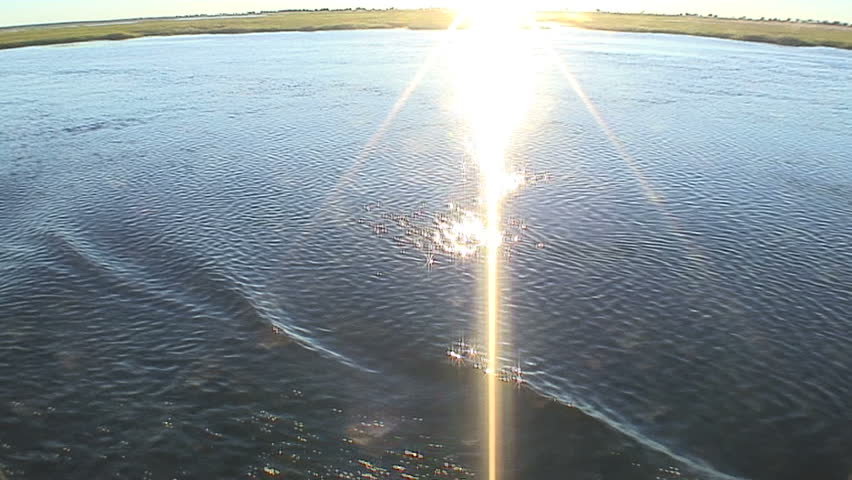 Fisheye: Glare of Boat Traveling the Zambezi