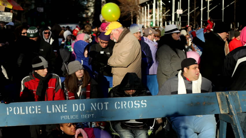 NEW YORK CITY, NY - NOVEMBER 24: People waiting for Macy's Parade behind police line on November 24, 2011 in New York City, New York. 
