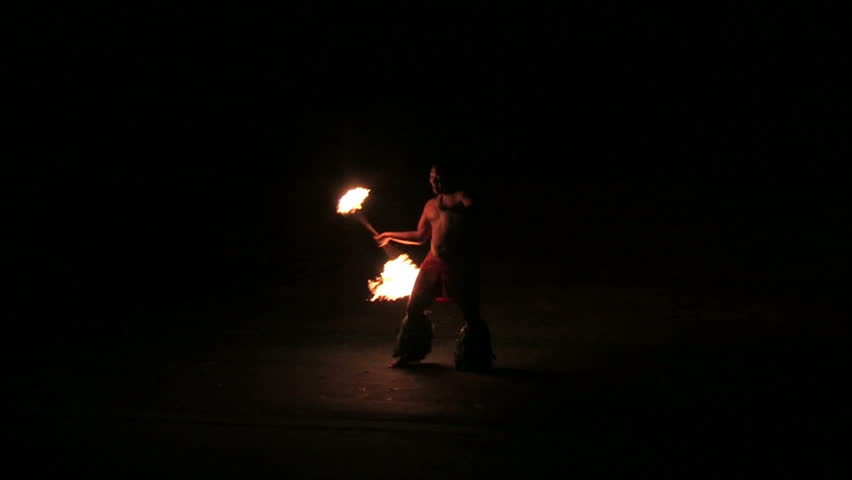 LAIE, OAHU, HAWAII CIRCA FEB 2008: College student performs at Polynesian Cultural Center where students act and dance to pay for expensive college tuition and expenses in Laie, Oahu, Hawaii