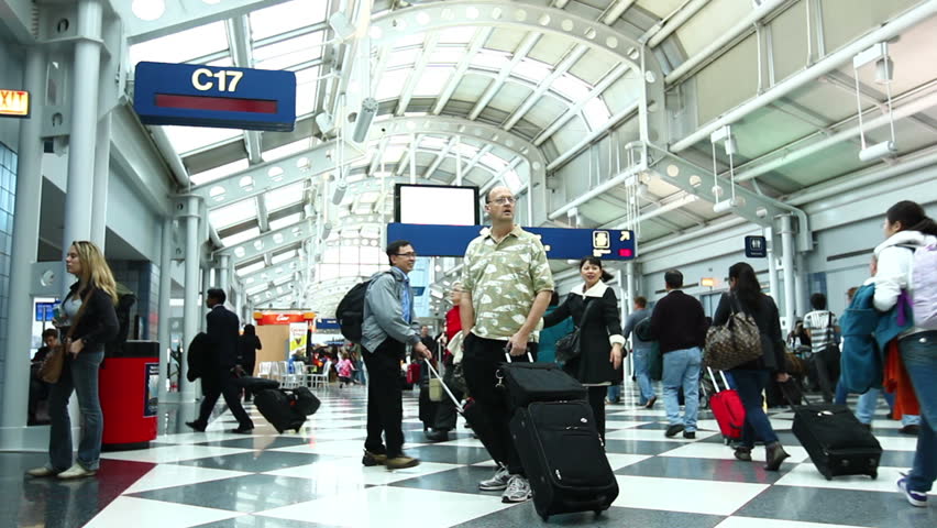 CHICAGO - FEB 2: (Timelapse View) People moving in the Chicago O'Hare Airport Febuary 2, 2011 in Chicago, IL. O'Hare is now the third busiest airport in the world with 66,665,390 passengers passing through the airport in 2010, a +3.3% change from 2009.