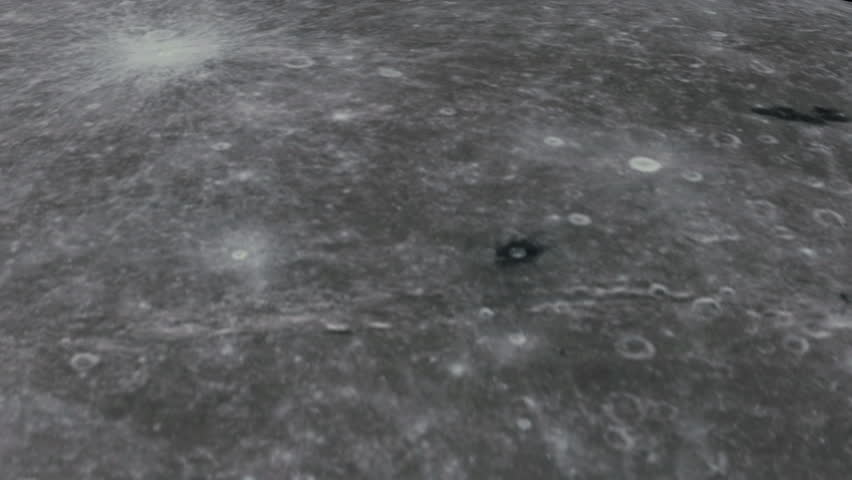 Flight over the Moon reveals Earth in the background.
