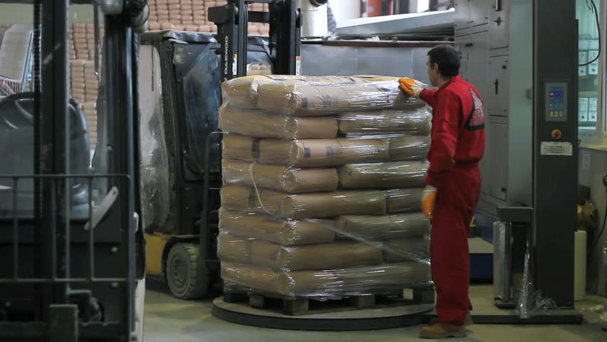 Workers at work in industrial warehouse. HD 1080i.