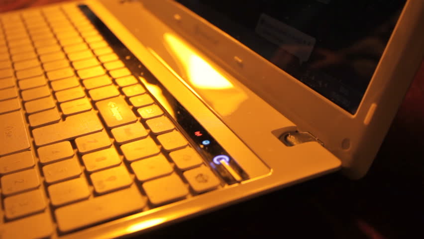 Tracking shot of typing on laptop computer 