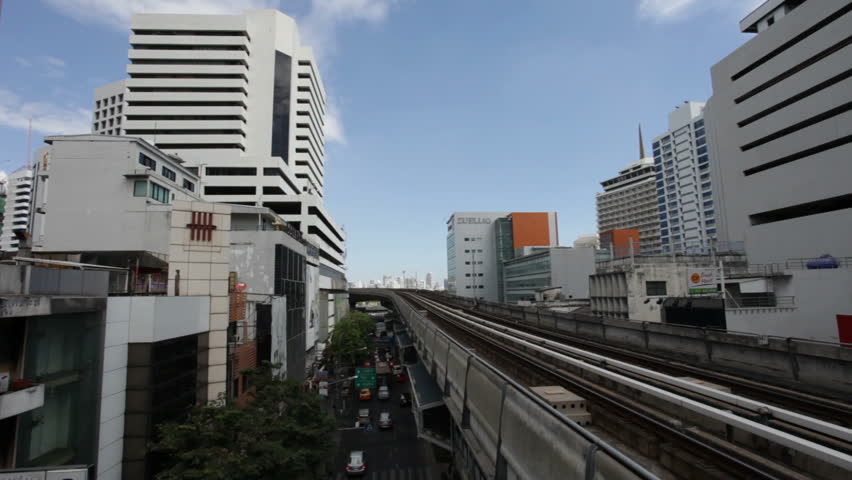 BANGKOK - NOVEMBER 27: A train departs from the Sala Daeng BTS Station on November 27, 2011. The BTS is Bangkok's aerial metro transportation.