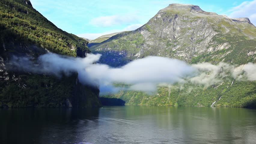 Clouds over Geiranger fjord. Fast motion effect.