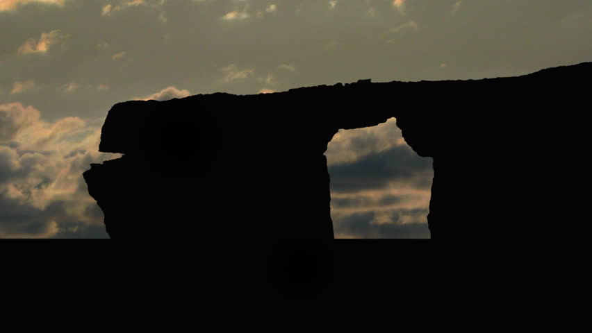 The Azure Window, Tieqa Zerqa,  is a natural arch in the Maltese island of Gozo featuring a table-like rock over the sea. It was created thousands of years ago when two limestone caves collapsed. 