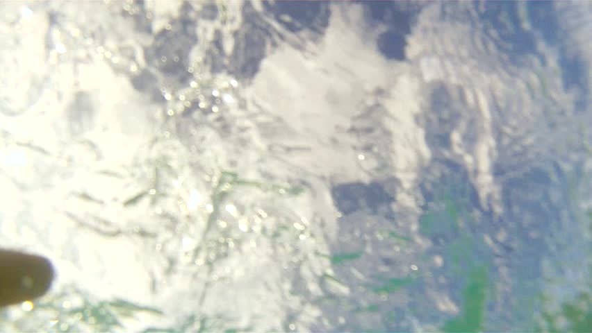 POV view of a man drowning in water.