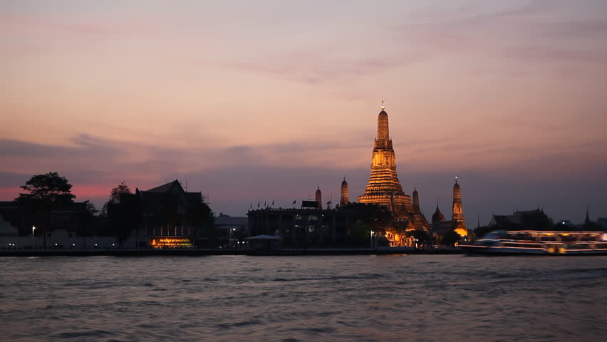 Time Lapse of Wat Arun, Buddhist Temple of the Dawn in Bangkok, Thailand, Chao Phraya River