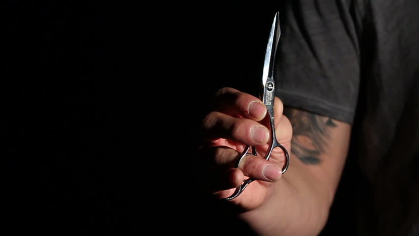 Man with Tattoo and HairStyle Scissors