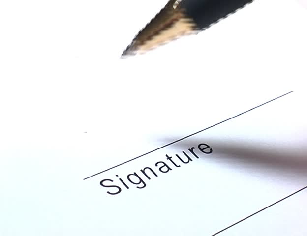 Closeup of signature writing