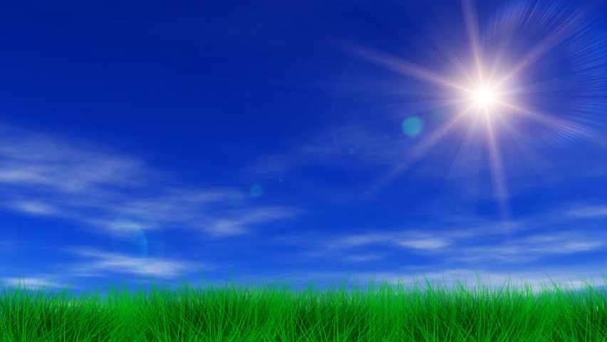 Blue sky, light clouds, slight breeze and lush green grass. HD seamless looping video animation.-