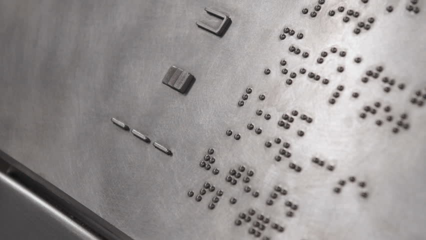 Braille signage with selective focus.