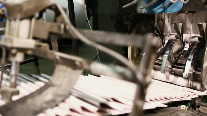 close-up newspaper on production line in a print shop