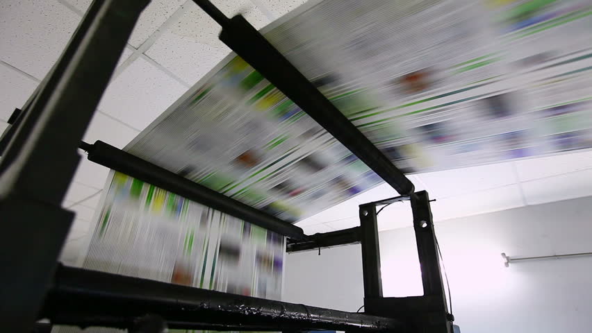color newspaper production line during work
