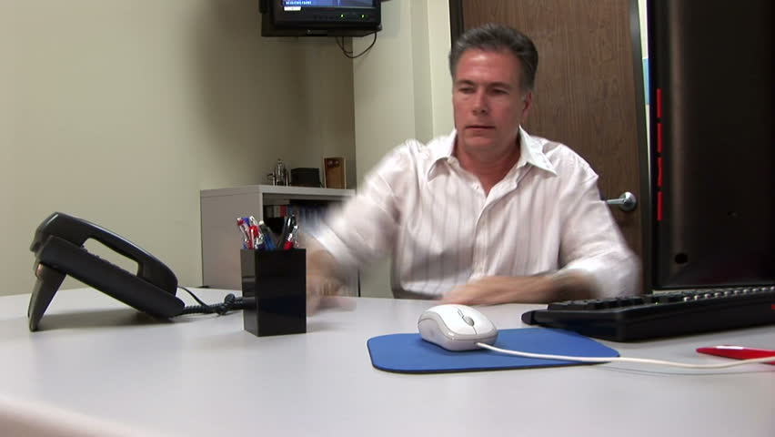 time lapse of a man bored with his job 