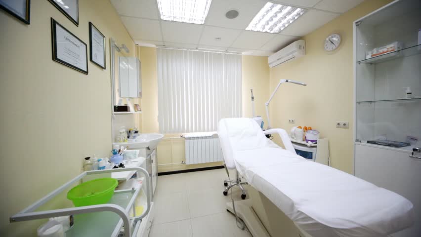 Cosmetology armchair stand at room center in beauty parlour