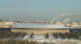 Pan on moscow winter city scape with arena