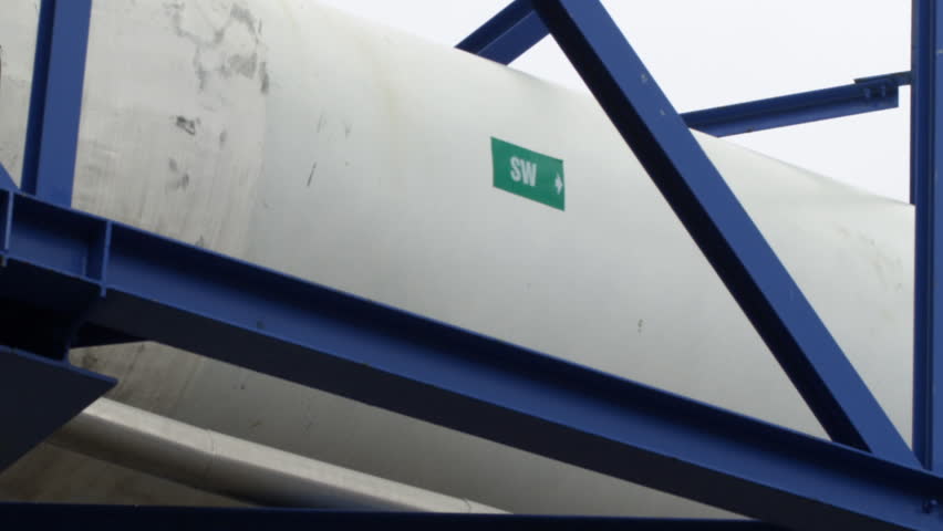 Desalination pipe and building shot in Israel.