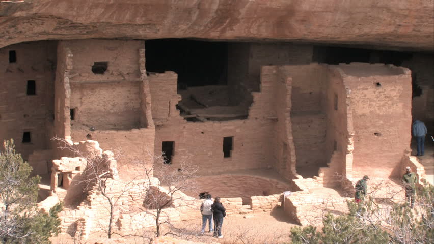 Mesa Verde National park in southern Colorado. Closer of Spruce Tree ruins, tourists and ranger. Ancient Pueblo cliff dwellings.  Historic Native American homeland and heritage. 