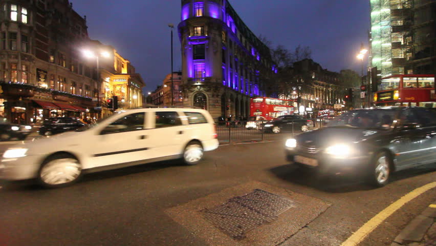 LONDON, UK - DECEMBER 27: Busses and other traffic drive at night in a busy street in the City of London on December 27, 2011 in London, UK. Oxford The City is the financial heart of London.