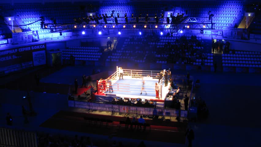 MOSCOW - JAN 13: (Timelapse View) Boxers battle on ring, on World series of boxing among club commands in sports Palace Krylatskoe - Basket-hall, on Jan 13, 2011 in Moscow, Russia