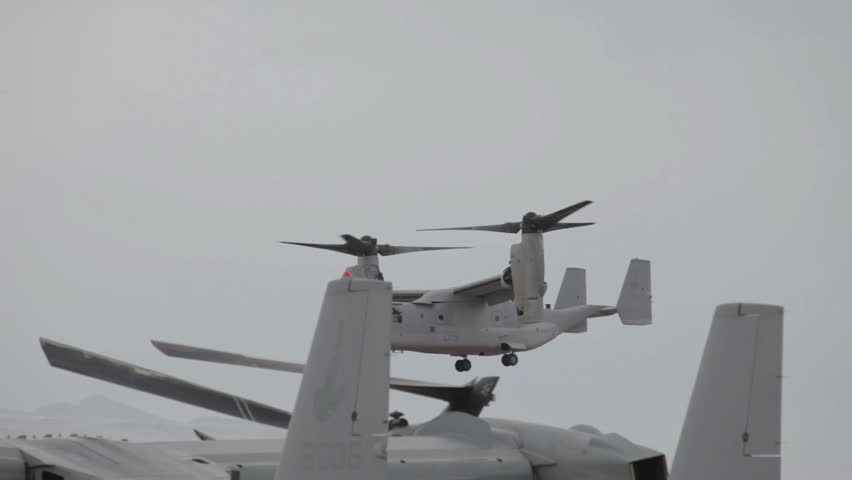 ST GEORGE, UTAH - MARCH 17: Aircraft V-22 Osprey VTOL hover mode doing vertical takeoff and landing on March 17, 2012 in St. George, Utah. USAF, Marines, Navy and NATO allies for transportation and troop movement worldwide.