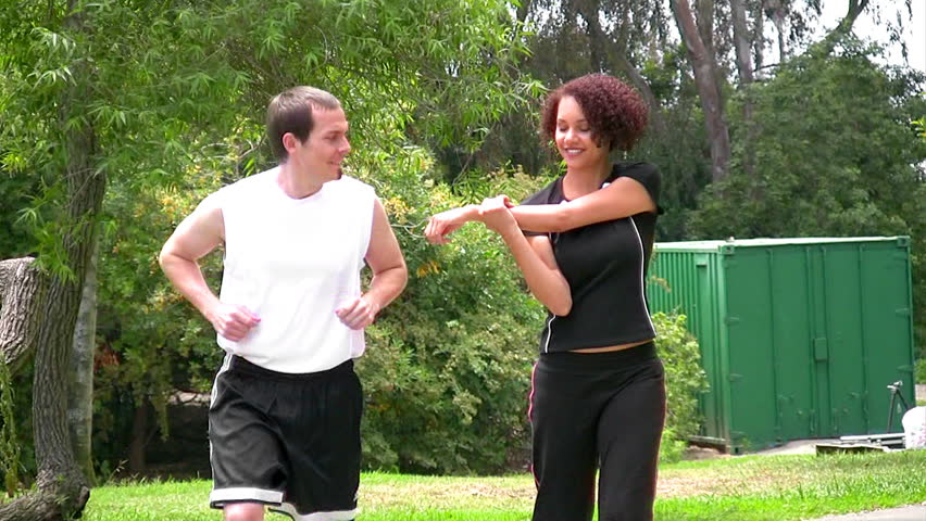 Couple having fun jogging