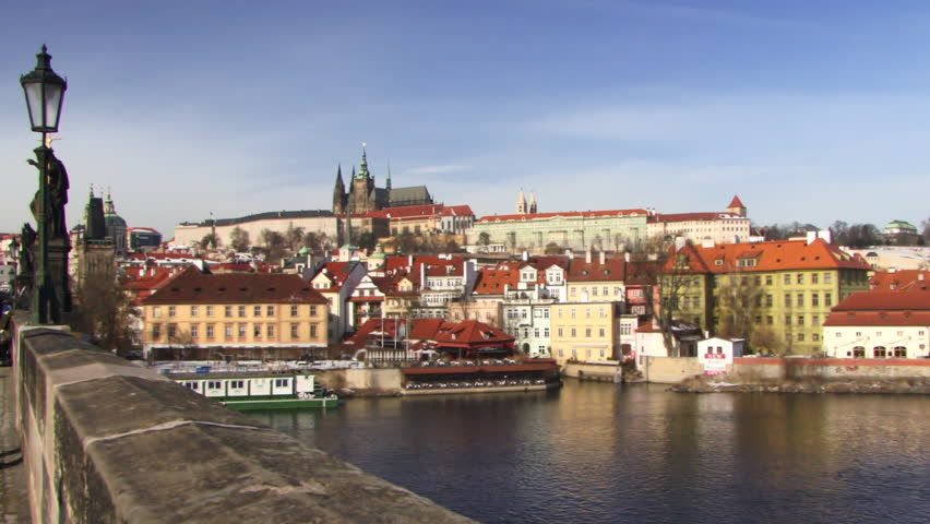 WIDE SHOT, PAN, Charles Bridge, Prague, Czech Republic, PAN over Vitava river
