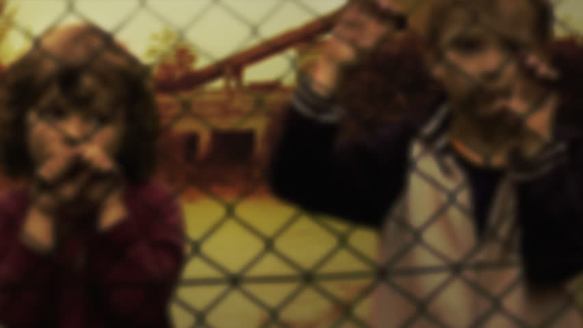 Abandonment of children. Loneliness in the slums. Children in the refugee camp. Children's loneliness. Static shot. Clip ID: children5_HD