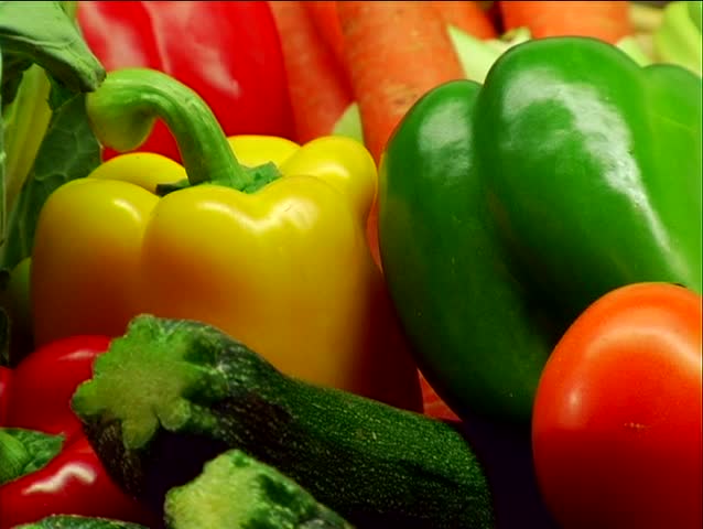 Shots from a basket full of vegetables, 3 shots: static close, static wide, pan over vegetables