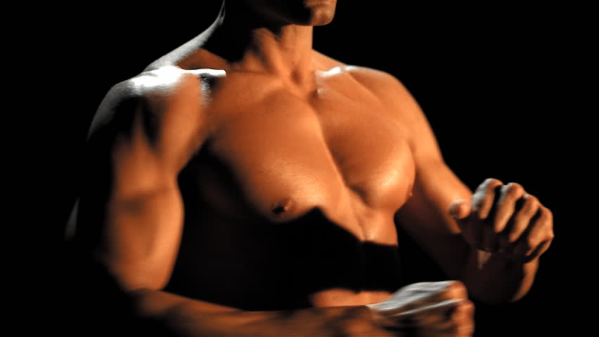 Male torso spins arm