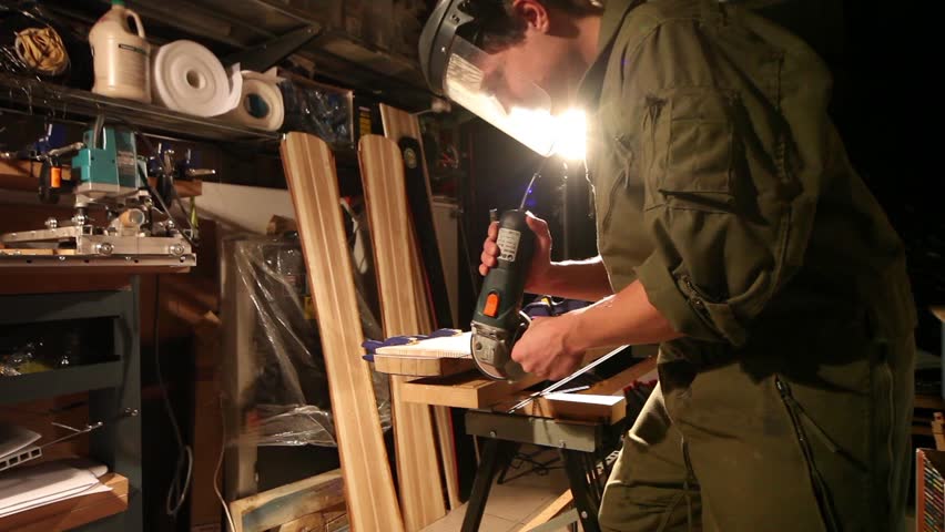 Workman in joinery workshop.