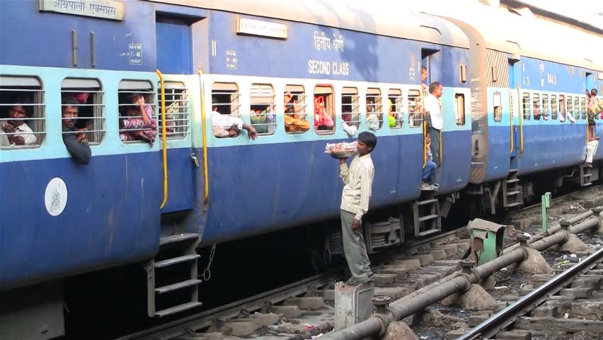 DELHI - NOV 13: People waiting on the train in the Delhi Junction Railway Station on November 13, 2011 in Delhi, India. Delhi Junction is the oldest railway station of Delhi city.