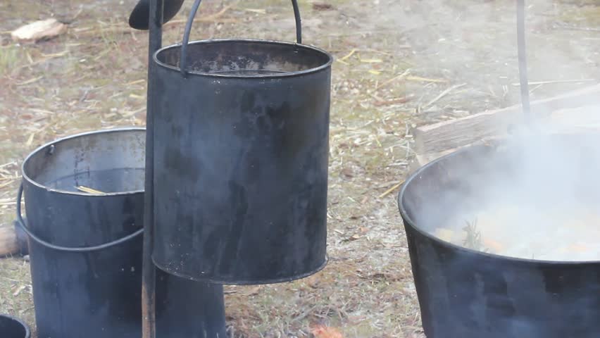 Group Of Old Style Group Of Cast Iron Cooking Outside