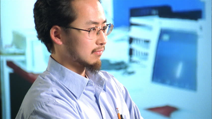 Portrait of computer worker in office