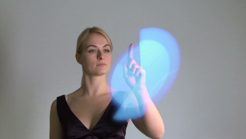 Female moving graphs on touch screen wall, virtual reality, touch screen, medium shot, static shot