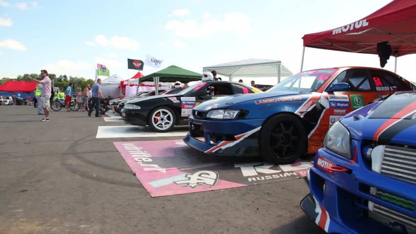 MOSCOW - JUN 11: Cars stand ready by beginning of competitions, on 3rd stage of championship on drift Megafon-RDS 2011, on Jun 11, 2011 in Moscow, Russia