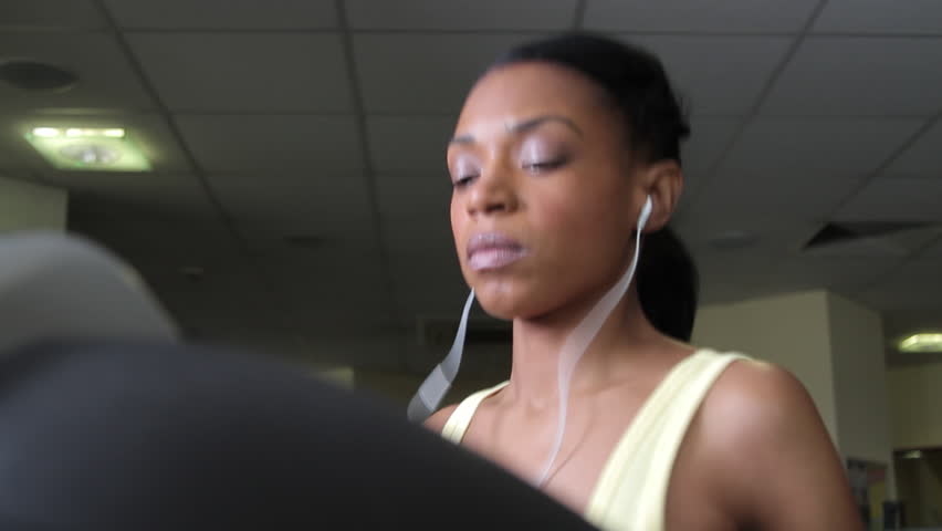 Female running on treadmills, cardio workout exercise in gym