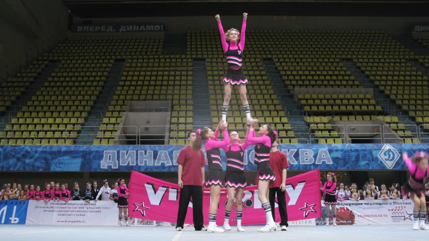 MOSCOW - MAR 24: (Timelapse View) Gymnasts of different teams participates in competitions of Championship of Moscow on cheerleading in Dynamo sports palace, on March 24, 2012 in Moscow, Russia
