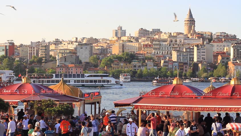 ISTANBUL - JUNE 21: Eminonu Pier looking to Goldenhorn and Galata Tower on June 21, 2011 in Istanbul. Eminonu Region is the major trade and tourism center in the city. 
