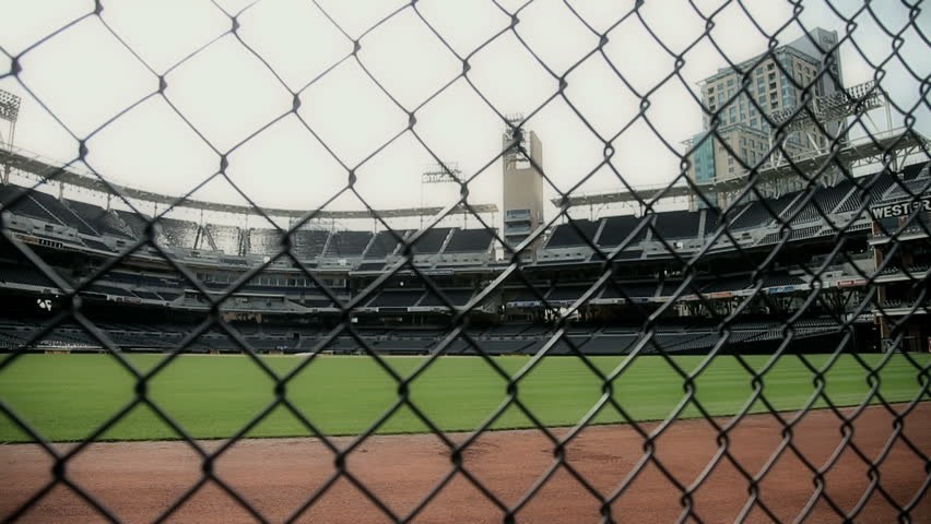 San Diego - Circa 2009: San Diego Padres stadium in 2009. Panning left to right view of stadium looking through chain link fence in California.