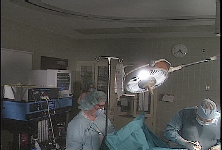 Surgeon in operating room - 3 shot