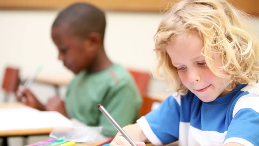 Pupils whispering in the classroom